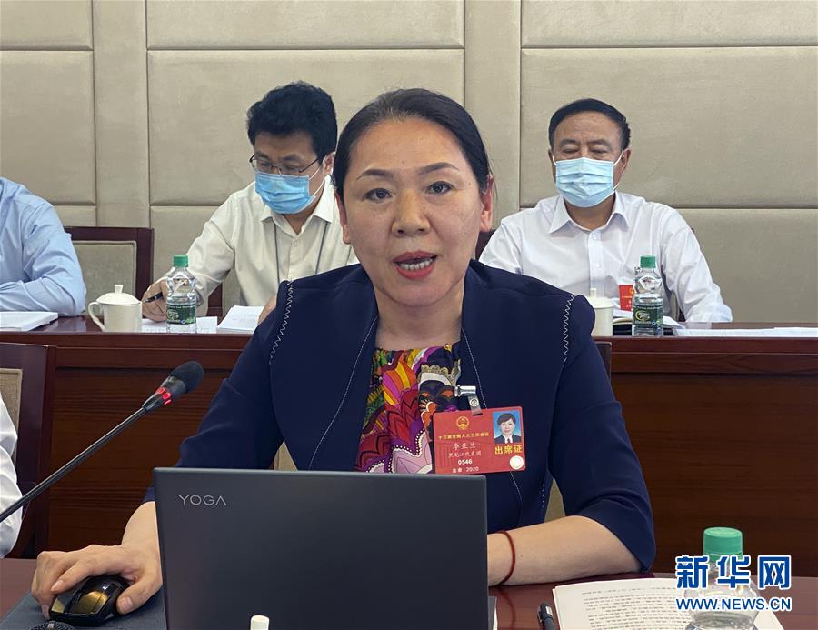 （兩會(huì)&middot;熱點(diǎn)畫報(bào)）（3）代表委員聚焦民法典草案