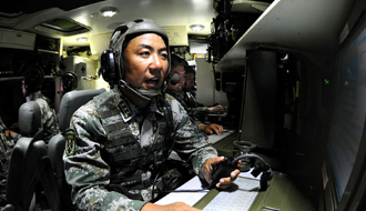 記北京軍區某機步團團長滿廣志