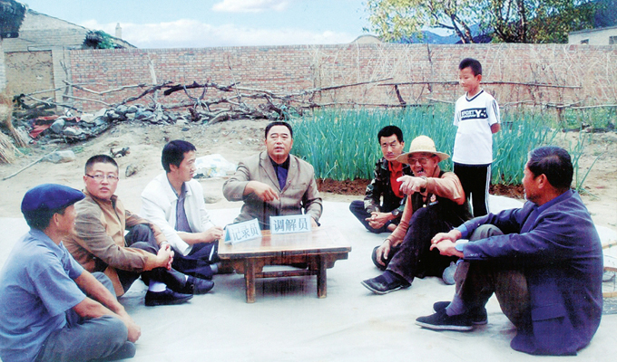 調解“家長里短,雞毛蒜皮”的小事情是李培斌從事的大事業