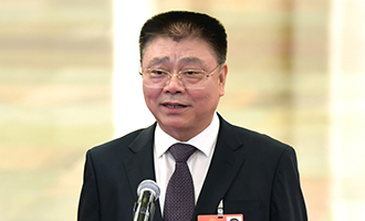 住房和城鄉建設部部長王蒙徽在“部長通道”接受采訪