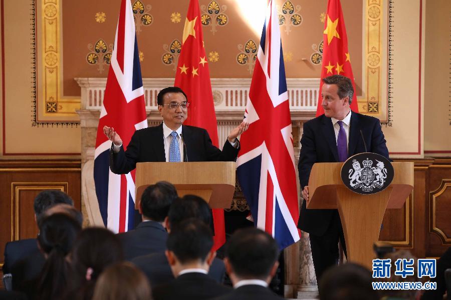 6月17日，國務(wù)院總理李克強(qiáng)同英國首相卡梅倫在倫敦舉行中英總理年度會(huì)晤后共同會(huì)見記者。新華社記者 龐興雷 攝