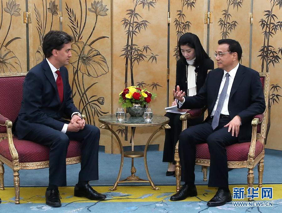 6月18日，國務(wù)院總理李克強(qiáng)在倫敦會(huì)見英國工黨領(lǐng)袖埃德·米利班德。新華社記者 龐興雷 攝